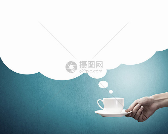 咖啡休息时间紧紧地握住白色的茶咖啡图片