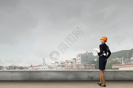 优雅的女工程师轻的女建筑师硬帽控股项目手图片