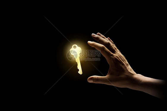 钥匙手特写商业人士持闪亮钥匙的形象图片