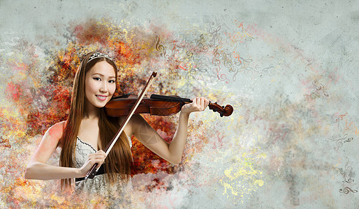 女小提琴手轻漂亮的亚洲女人拉小提琴轻的天才图片