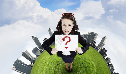 带横幅的女孩高举白色的陷入困境的女商人的最高视野图片素材