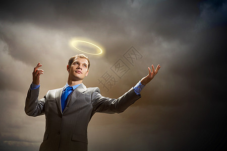 客户上帝徒商人头顶光环的商人的形象背景