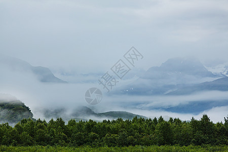 阿拉斯加的山脉夏天阿拉斯加风景如画的山脉积雪覆盖的地块,冰川岩石峰图片