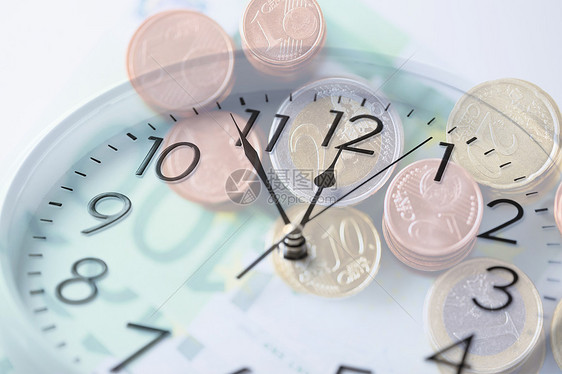时间,商业,赚钱金融时钟欧元硬币纸币双重曝光效应图片