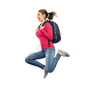 教育,旅游,运动人的微笑的轻妇女学生背包跳跃空中的白色背景图片