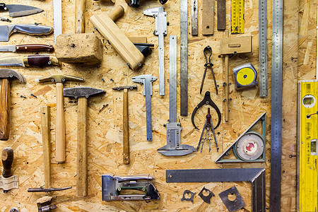 木工木工设备车间墙上挂着的工作工具车间墙上挂着的工作工具图片