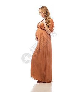 怀孕,母亲,人期望的快乐的孕妇触摸她的大肚子白色的背景快乐的孕妇抚摸她的大肚子背景图片