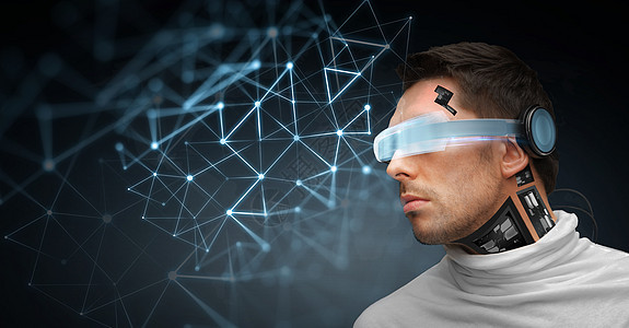 人,技术,未来进步人与三维眼镜微芯片植入传感器与虚拟网络投影黑暗的背景带着未来眼镜传感器的男人图片