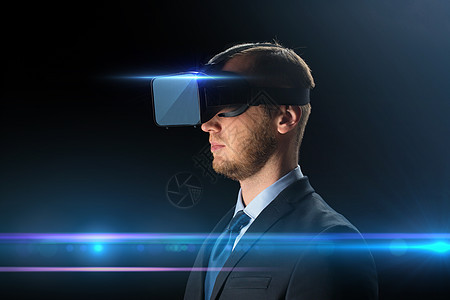 技术,人,网络增强现实轻商人与虚拟耳机3D眼镜黑色背景激光商人虚拟现实眼镜耳机图片