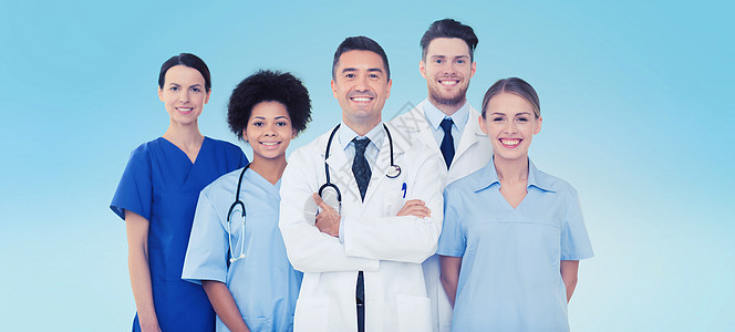 医院,职业,人医学的群蓝色背景的快乐医生群蓝色背景的快乐医生图片