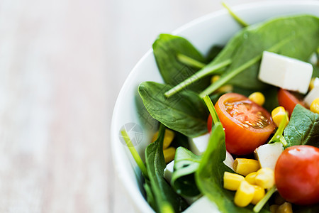健康的饮食,食物,节食素食的蔬菜沙拉碗把蔬菜沙拉关碗里图片