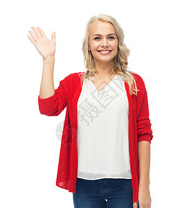 手势,时尚,肖像人的快乐的微笑轻女人穿着红色开襟羊毛衫挥手白色快乐微笑的轻女人挥手过白色图片