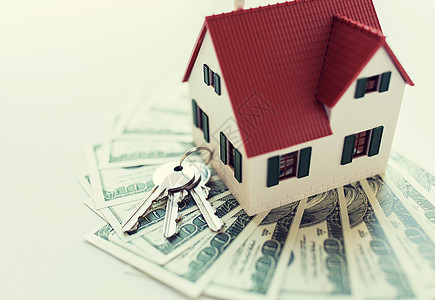 抵押贷款,投资,房地产财产家庭模式,美元货币房屋钥匙家庭模型,钱房子钥匙图片
