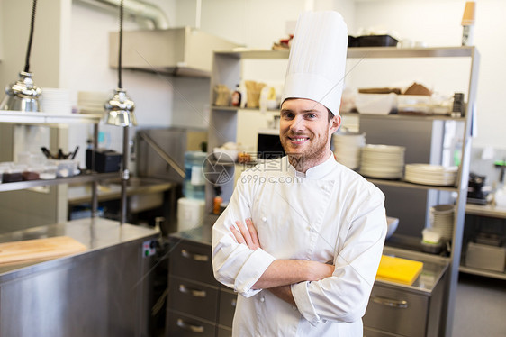烹饪,职业人的快乐的男厨师餐厅厨房交叉双手烹饪快乐的男厨师餐厅厨房饭图片