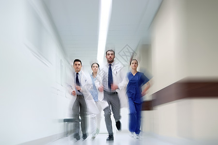 人,保健医学医疗人员沿医院运行运动模糊效应群医生沿着医院走图片