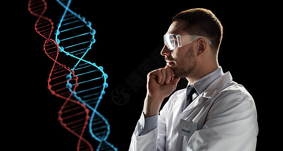 遗传学,科学人的男医生科学家穿着白色外套安全眼镜,看DNA分子黑色背景上的虚拟投影护目镜科学家观察DNA分子图片
