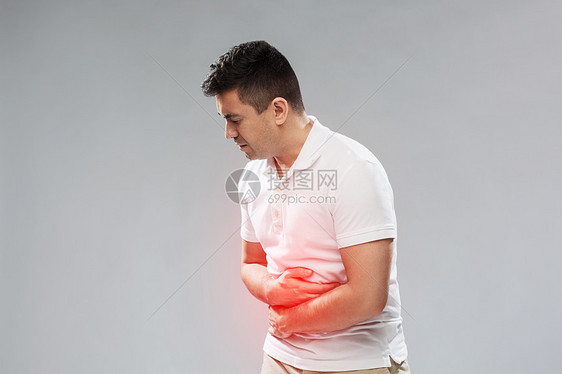 人,医疗保健健康问题的幸的人患胃痛的灰色背景幸的人胃痛图片