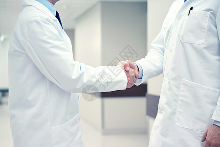 医疗保健,职业,人医学的密切医生的握手医生进行握手图片