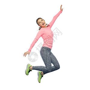 运动,健身,运动人的快乐的微笑轻女人空中跳过白色的背景快乐微笑运动的轻女人空中跳跃图片
