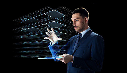 商业,人未来的技术商人适合与透明平板电脑虚拟建筑全息图黑色背景下工作拥平板电脑虚拟建筑的商人图片