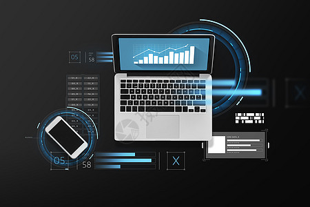 商业,统计技术笔记本电脑与图表屏幕智能手机顶部视图笔记本电脑屏幕智能手机上的图表图片