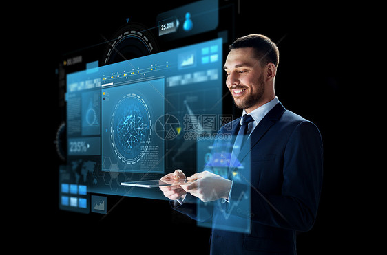 商业,人,增强现实现代技术商人适合与透明平板电脑虚拟屏幕投影黑色背景拥平板电脑虚拟屏幕的商人图片
