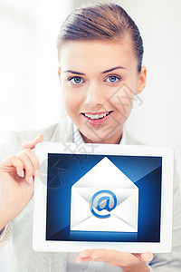 商业,通信互联网女商人持平板电脑与电子邮件标志女商人持平板电脑与电子邮件标志图片