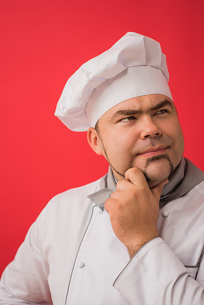 厨师制服思维的白种人的肖像图片