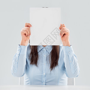 商业妇女的肖像,她前着白纸图片