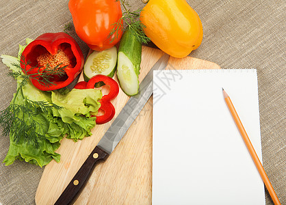烹饪蔬菜蔬菜笔记本的地方健康生活方式的象征图片