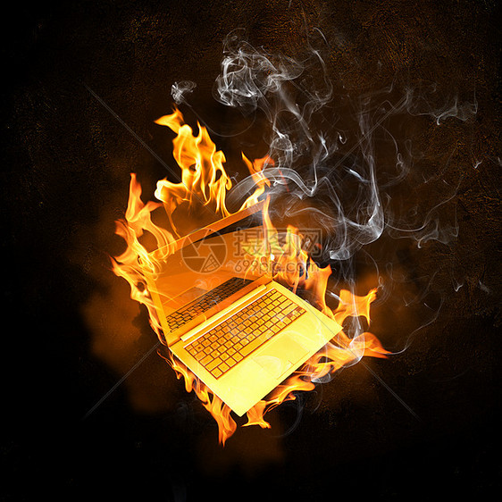 笔记本电脑着火了火灾中燃烧笔记本电脑的插图图片