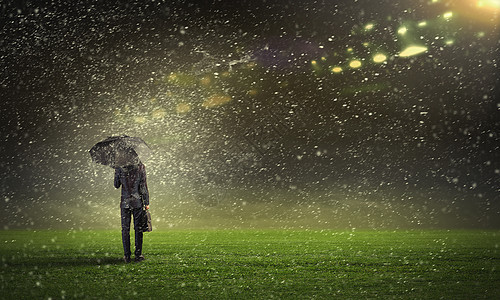 带着黑色雨伞的人商人的背景,伞站雨下图片