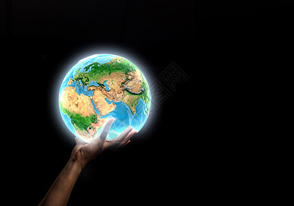 地球行星紧紧握住地球行星的人的手这幅图像的元素由美国宇航局提供的图片