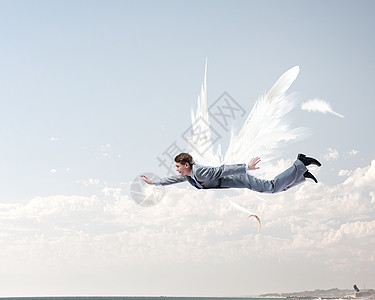飞得更高的氢气球商人飞得很高轻的商人,长着翅膀天空中飞翔背景