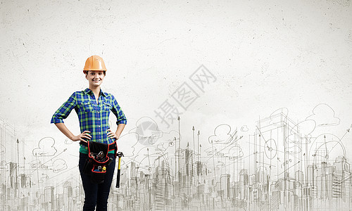 城市建设轻的女建筑工人戴着安全帽图片