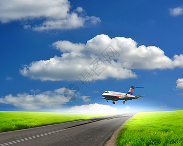 白色客机带云的蓝天的图像图片