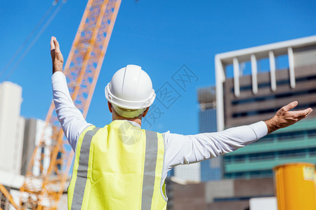 建筑工地的工程师建设者建筑工程师施工场景穿着安全背心图片