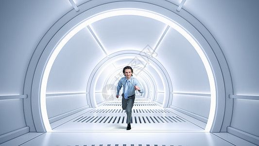 男人虚拟房间里跑步轻的商人未来的隧道里跑步图片