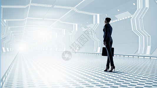 未来主义女人女商人站虚拟的隧道室里图片