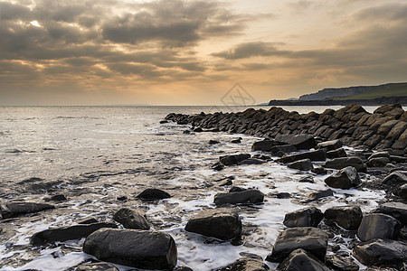 惊人的日落景观图像的岩石海岸线多塞特英国图片