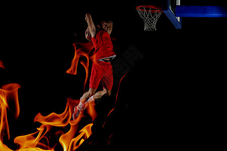 双曝光的火篮球运动员,体育运动员行动中隔离黑色背景上图片