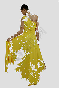 双曝光女时尚服饰与自然树枝背景背景图片
