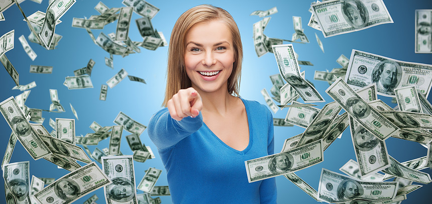 商业 金钱 金融 人手势微笑的女人与美元现金钱指向你蓝色背景图片素材 正版创意图片 摄图网 商业 金钱 金融 人手势微笑的女人与美元现金钱指向你蓝色背景图片素材 正版创意图片 摄图网