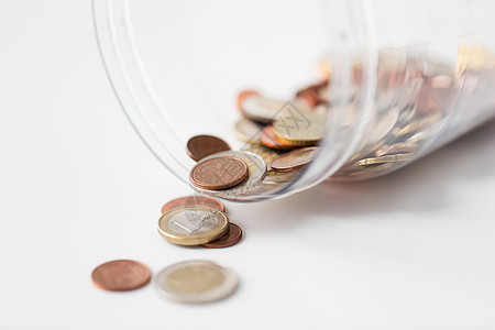 商业,金融,投资,省钱预算欧元硬币璃瓶桌子上图片