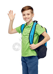 童,学校,教育,问候手势人的快乐的微笑学生男孩与书包挥手图片