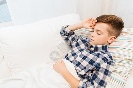 童,医疗,人医学生病的男孩流感躺床上,家里头痛图片