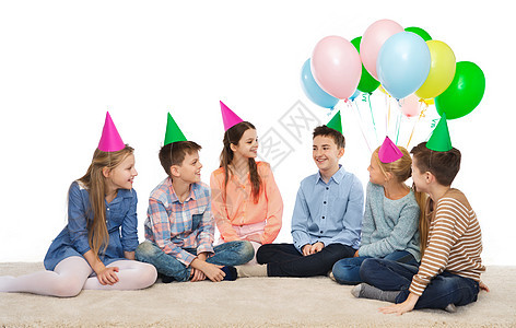 童,假期,友谊人的生日时戴着派帽的快乐微笑的孩子图片