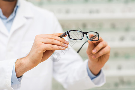 保健,人,视力视力光学店的眼镜手眼镜图片