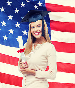 戴着美国证书的毕业帽的快乐学生证书的毕业帽学生图片