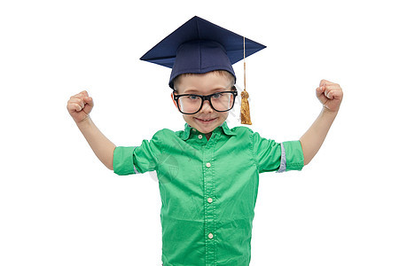 童,学校,教育,知识人的快乐的男孩学士帽沙浆板眼镜强壮的手图片